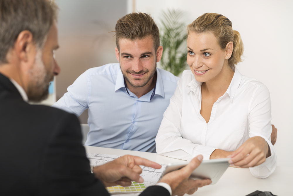 Young couple save on their mortgage