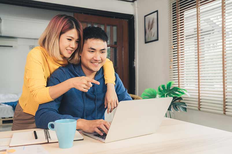 Couple seeking home loan and organising their debt-to-income ratio